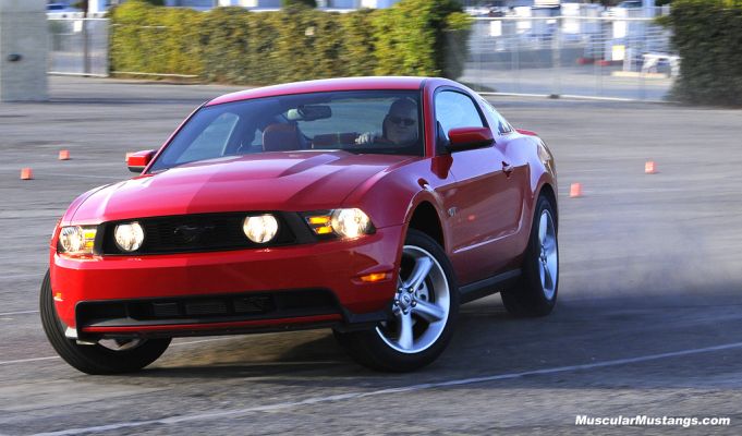 Red 2010 Mustang GT Drifting