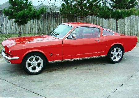 A beautiful 1965 Mustang fastback with Shelbystyle quarter windows 